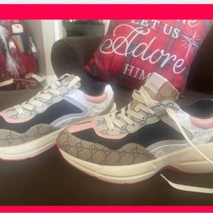 Tan, grey, pink and navy blue GG sneakers. Beand new never worn…too big for me